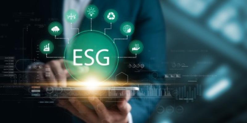 Infografía con una mano y las letras ESG haciendo alusión a empresas responsables