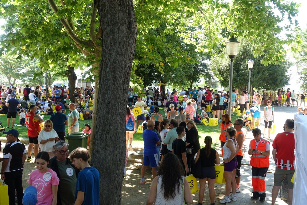 Llegada de participantes en la carrera Corre por Claudia