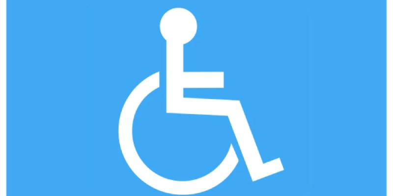 Logo persona en silla de ruedas