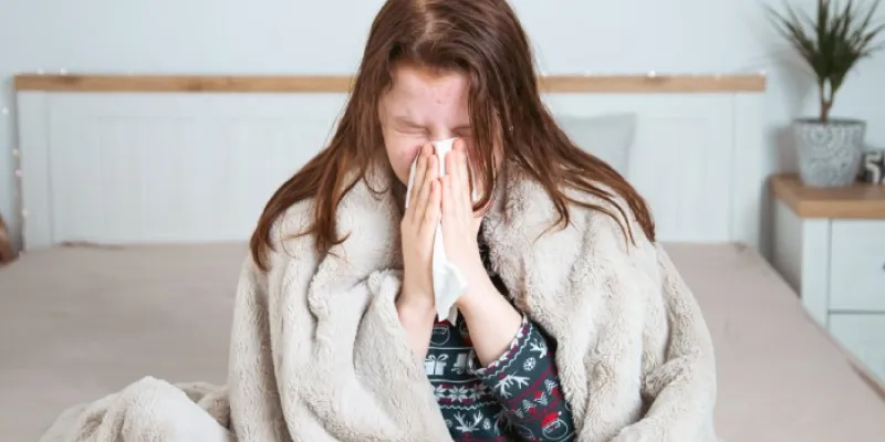 mujer con gripe