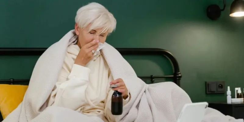 Mujer con fiebre