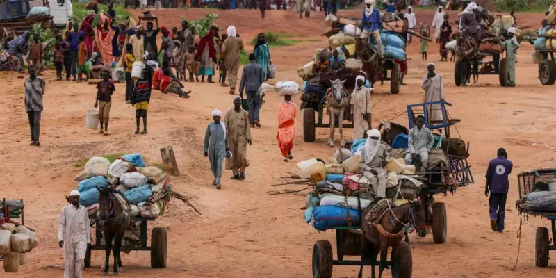 Sudaneses que huyen de la violencia en Darfur Occidental cruzan la frontera hacia Adre, ChadImagen