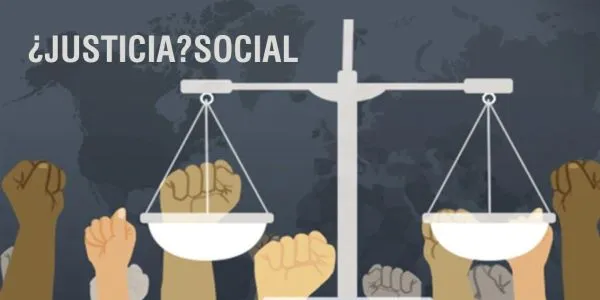 Unas manos sujetan la balanza de la Justicia 