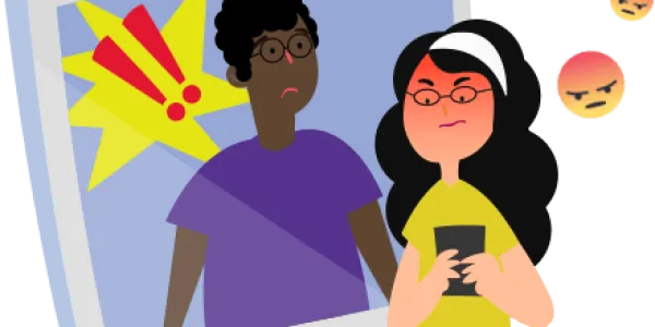 Una persona escribiendo un comentario negativo en redes sociales