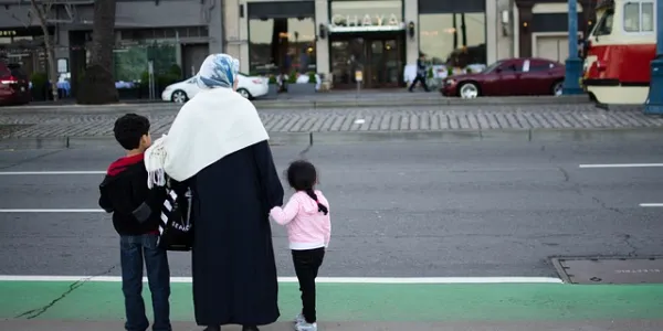 Familia de personas migrantes